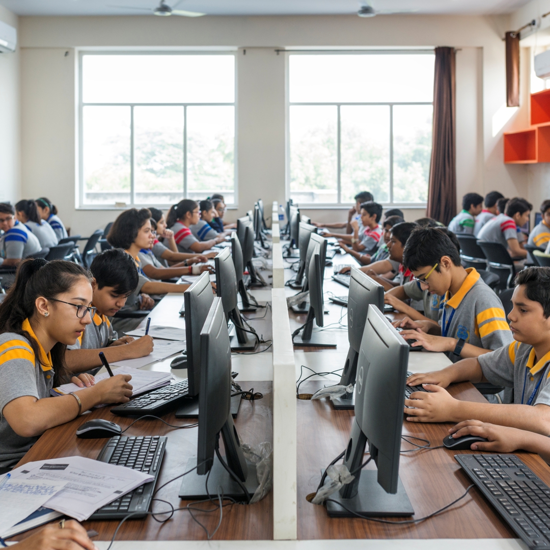 Narayana Schools students actively participating in a classroom activity demonstrating academic engagement and focus